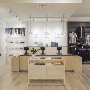 Interior of Kit And Ace store showing front desk with cash registers