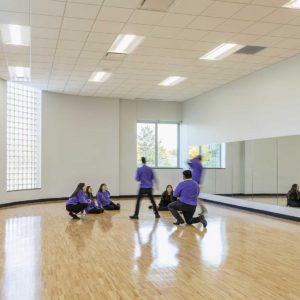 Students acting out a scene in high school drama class