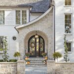 Front Exterior Entrance – Stone and White Brick Home