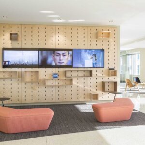 Media wall in seating area of lobby