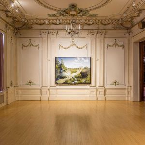 Large photograph hung in ornate salon in the American Swedish Institute